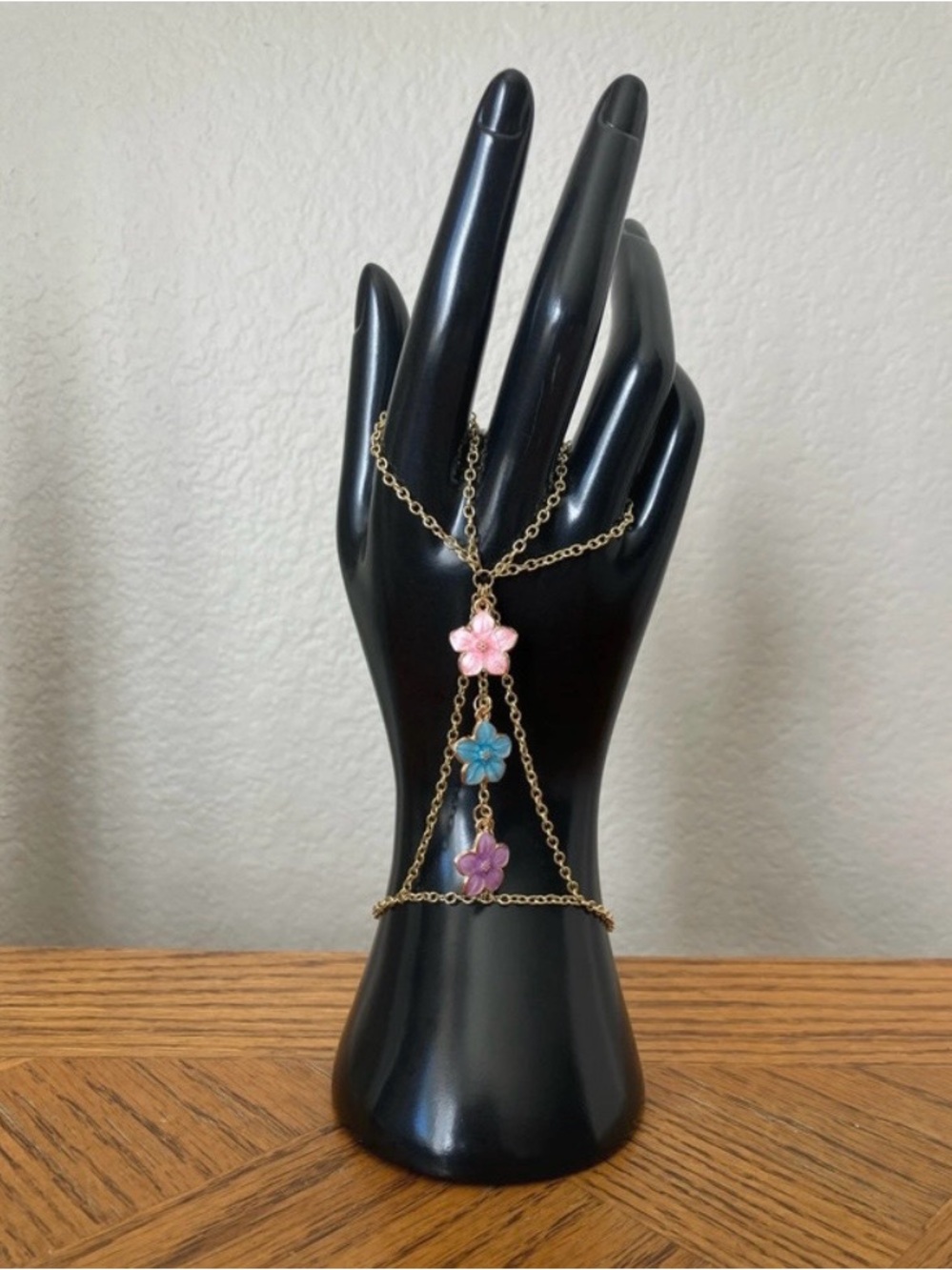 Gold-Tone Two-Ring Hand Chain with Pink, Blue & Purple Flower Charms